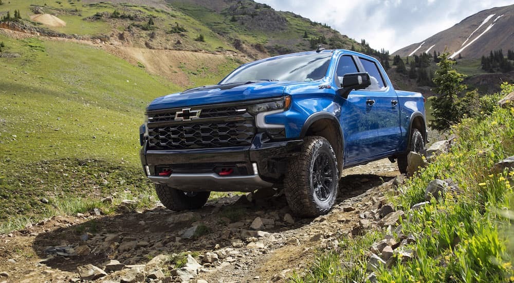 Blue 2022 Chevy Silverado 1500 ZR2 driving off-road
