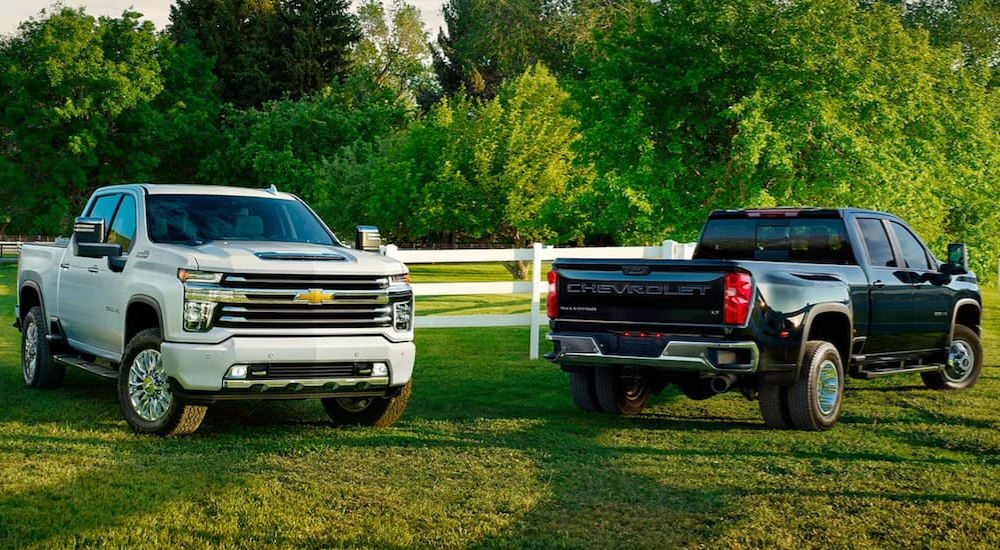 Two Chevy Silverado HD parked side by side