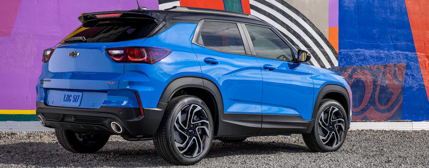A blue 2025 Chevy Trailblazer from the rear at an angle.